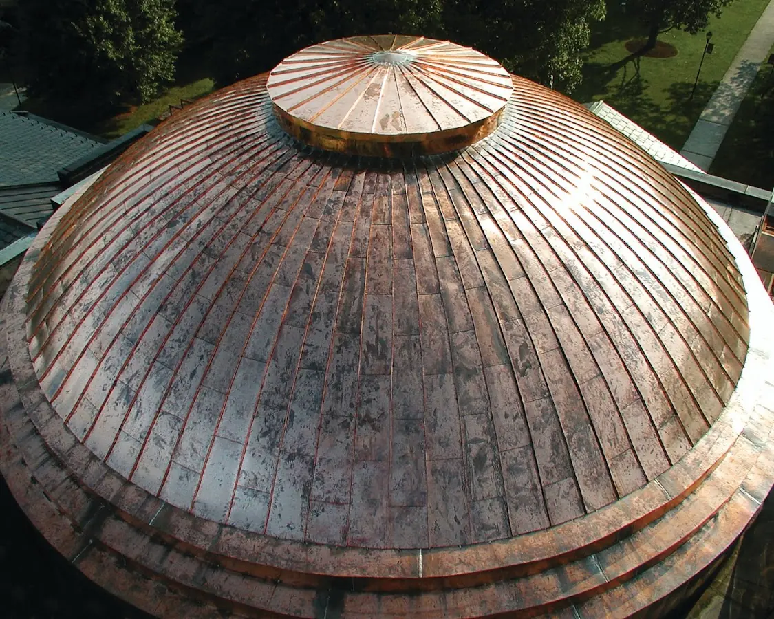 Craftsman Roofing crew installing a new roof in South Utica